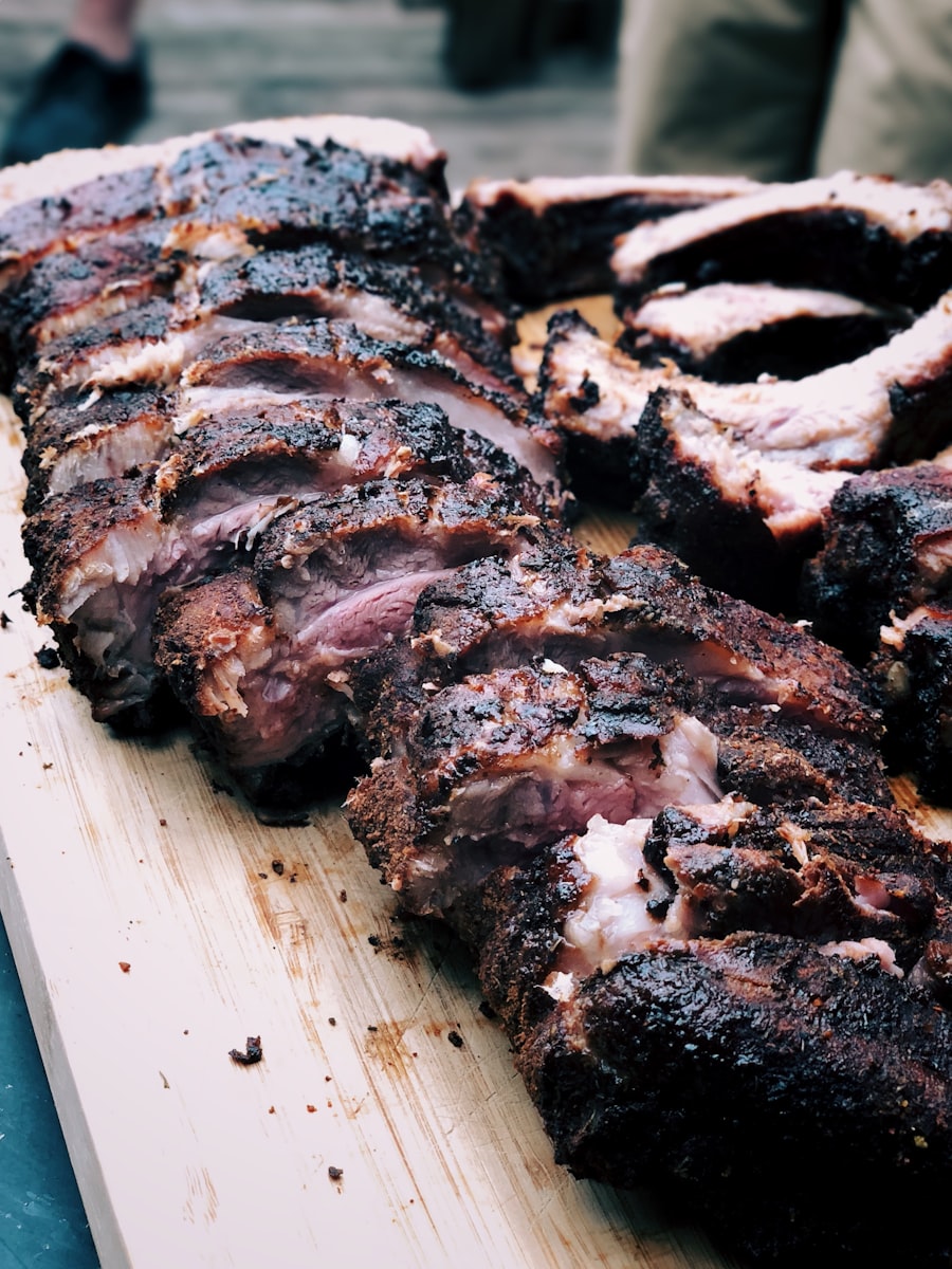 The Bo Jackson Signature Foods team gathered around a backyard grill